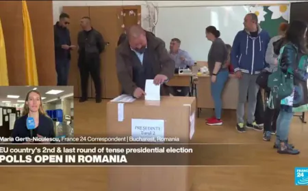 Polls open in Romania for a tense presidential runoff that pits nationalist against pro-EU centrist