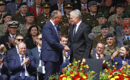 Germany's Merz inaugurates new brigade in Lithuania, saying Russia 'is a threat to us all'