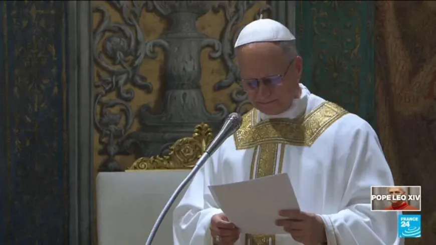 Chicago-born Pope Leo XIV offers a few words in English at his first Mass
