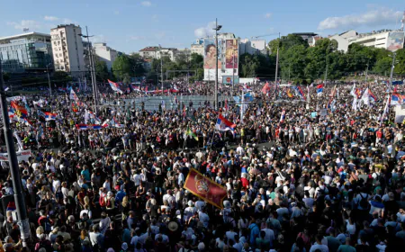 Tens of thousands rally in Serbia's capital to demand snap elections