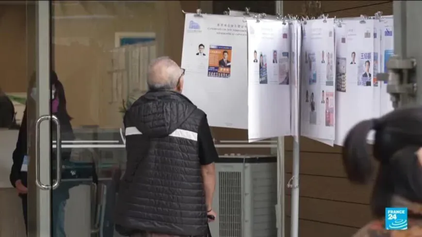 Hong Kong holds tightly guarded election amid anger over deadly fire