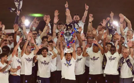 PSG players parade Champions League trophy after night of unrest in Paris